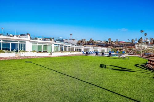 Dog-friendly home 3 rows to beach with rooftop deck, pool, hot tub, & kitchen