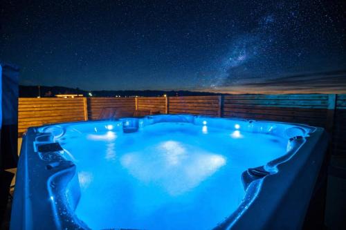 Hot Tub Meets Mojave Magic by Navigate Stays