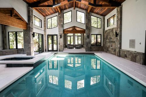 KBM Resorts Private Home Estate Indoor Pool Theater Pool Table Shuffle Board Workout room PAS-2680