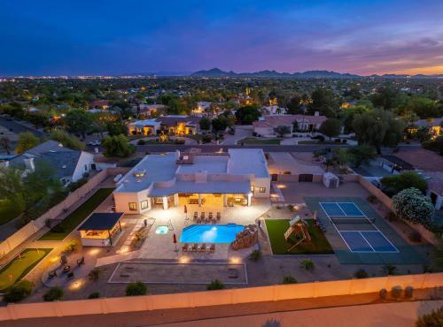 Luxury Oasis Slide Pool Pickleball Game Room