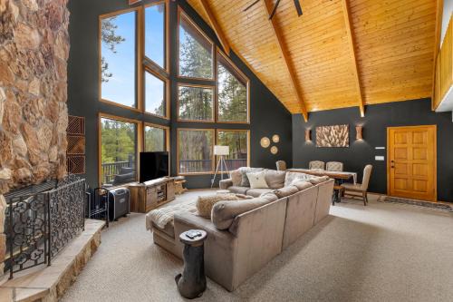 Modern Mountain Chalet with Wall-of-Windows Forest Views.