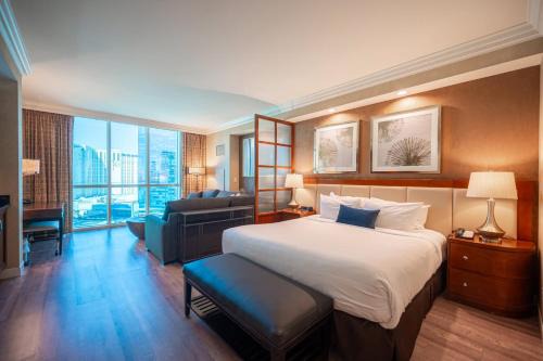 No Resort Fee Strip View Suite + Free Valet + Pool