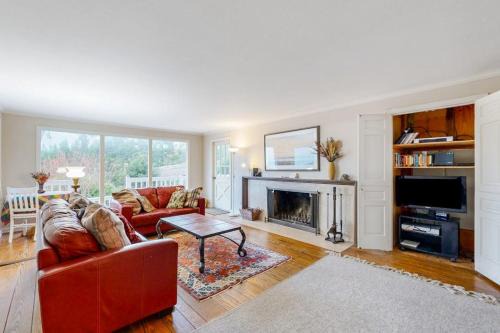 Oceanfront charmer with wood fireplace games & scenic deck - dog-friendly