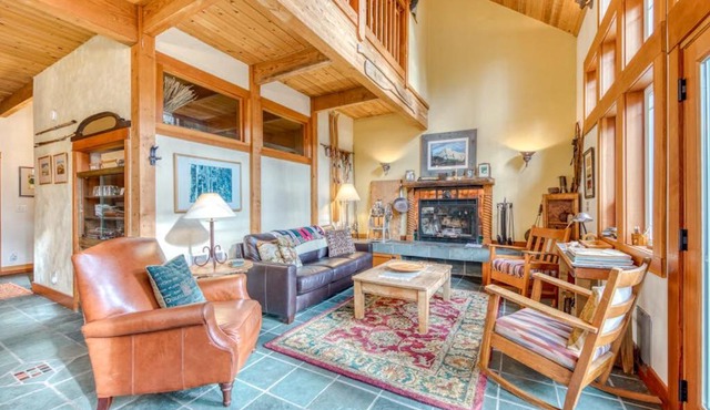 Riverfront home close to skiing & fishing with beach access & huge VHS library