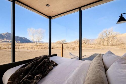 Secluded Desert Retreat with Mirrored Glass & Scenic Views | Near Torrey, Utah
