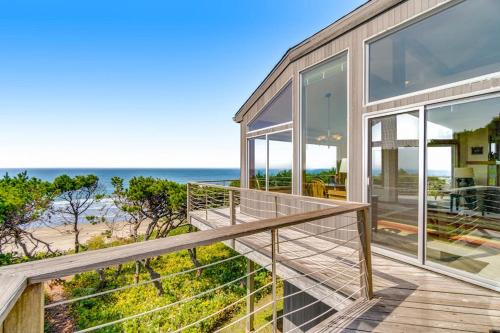 Spacious oceanfront home with free WiFi and wrap-around deck