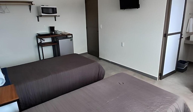 SUITE Clavel, AA, cocineta, baño privado, ubicació