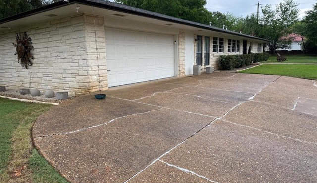 This spacious 4-BDRM, 2-BA home is a western YeeHaw Haven