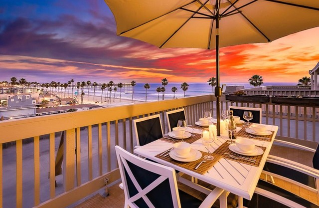 Beachfront beauty with ocean views, private balconies, pool/hot tub, & WiFi