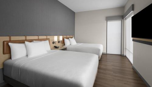 Deluxe Queen Room with Two Queen Beds, Sofa Bed and Accessible Tub