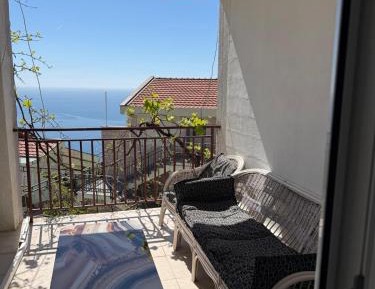 One-Bedroom Apartment with Balcony and Sea View