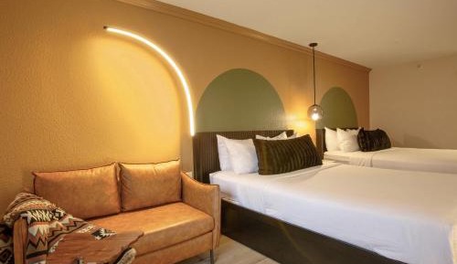 Room with Two Queen Beds and Sofa