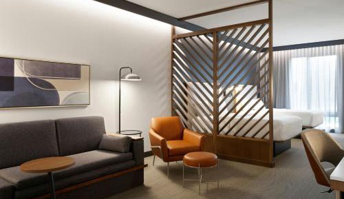 Queen Suite with Two Queen Beds and Sofa Bed