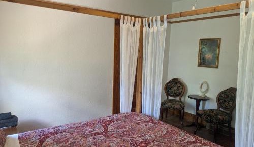 Queen Room with Shared Bathroom