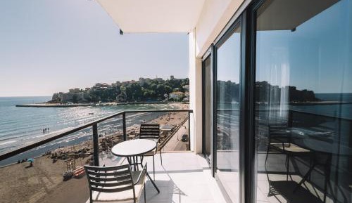 One-Bedroom Apartment with Balcony and Sea View