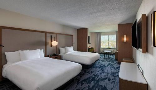 Queen Suite with Two Queen Beds and Sofa Bed