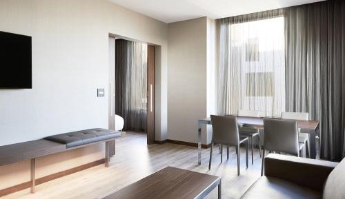 One-Bedroom King Suite with Courtyard View and Sofa Bed