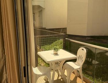 One-Bedroom Apartment with Balcony and City View