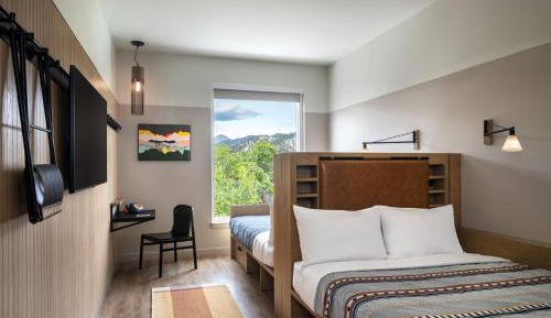 Moxy Queen Room with Two Queen Beds and Mountain View
