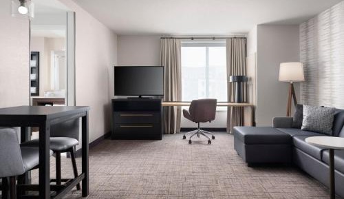 One-Bedroom King Suite with Sofa Bed and City View