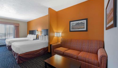 King Suite with One King, One Queen Bed, One Sofa Bed and Roll-In Shower - Disability Access/Non-Smoking